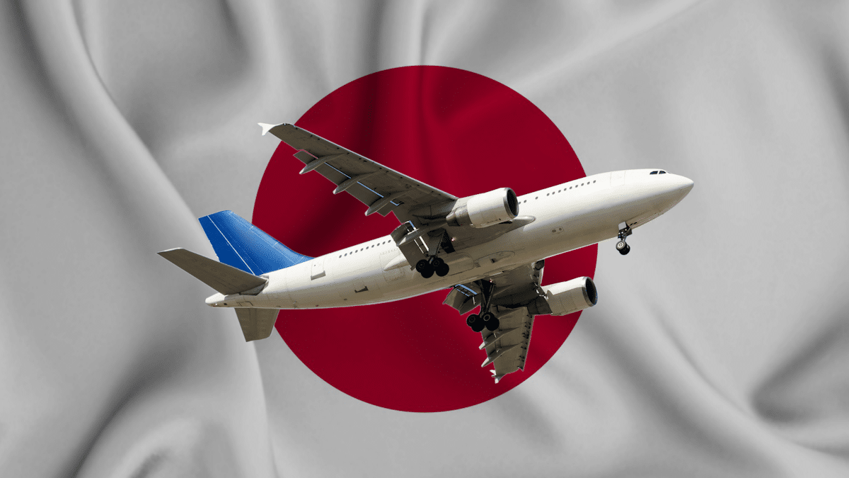 Picture up airplane against Japanese flag